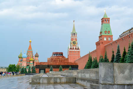 MOSCOW, Russia - June 26, 2017: The mausoleum with Lenin's body at Red Square, St. Basil's Cathedral, Kremlin Spasskaya Tower, a brick wall of the Kremlin, tourists at Red Squareのeditorial素材