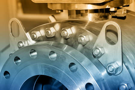 Steel parts for heavy industy machinery round shape. Brown toned image. Close up.の写真素材