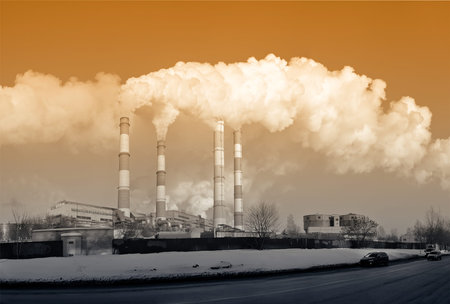 View of the thermal power plant, smoke from the chimney. Concept: air pollution, global warming....
