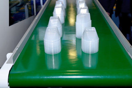 Industrial machine for production disposable plastic tableware.
