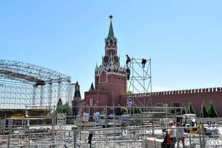 Moscow, Russia - May 16, 2019: Installation of metal structures for the event on Red Square. Metal structures on the background of the Spassky Tower of the Moscow Kremlin.のeditorial素材