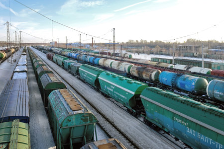 Moscow region, Russia, February 27, 2021: Big cargo freigt train railroad station, view from above....