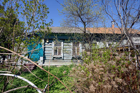 Typical retro Russian cottage, dacha in Russian. Dacha is a house for seasonal residence, located in the countryside.のeditorial素材