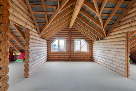 Country house made of logs, interior without furniture. Log house interior under construction