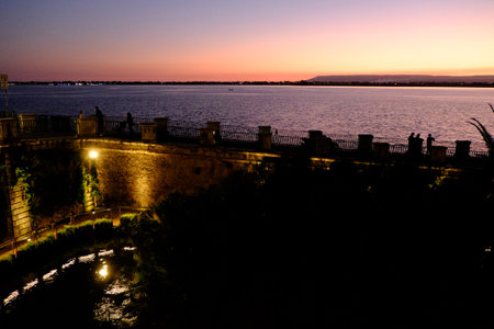 Syracuse, Italy - October, 2020. Arethusa spring at sunsetの写真素材