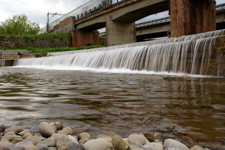 waterfall and train flowingの写真素材