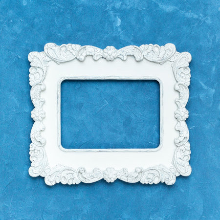 vintage frame on spotty finely textured coating blue colorの写真素材