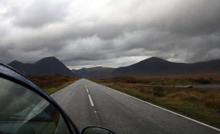 Driving through Scotland in cloudy weatherの写真素材