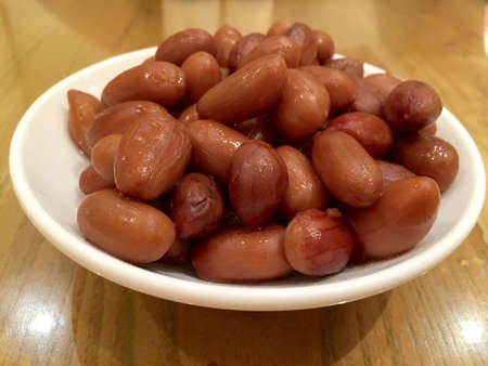 Plate of braised peanuts as appetizerの素材