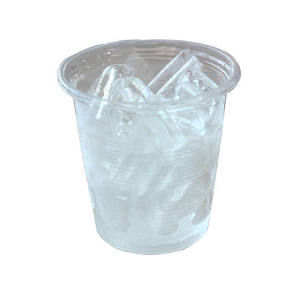 ice in plastic glass isolated on white backgroundの写真素材