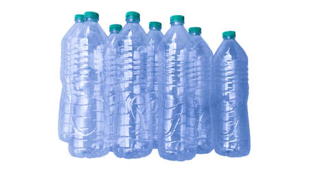 Stacked plastic water bottles are a waste that pollutes the environment. can manage to reduce pollution Separate the label from the bottle before recycling on a white background.の写真素材