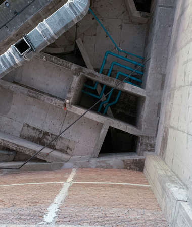 Lay PVC water pipes and place air conditioner pipes in the construction building.の写真素材