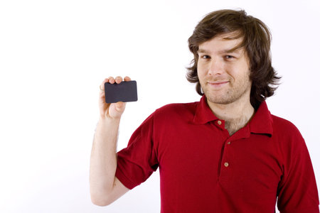 casual young man presenting a blank card
