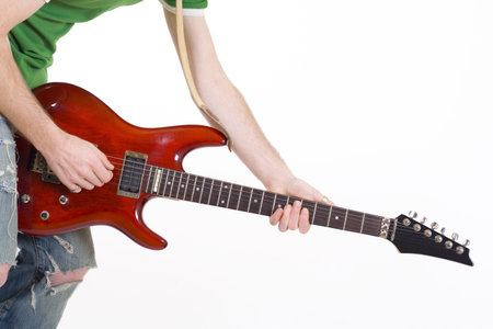 closeup of a guitar player playing his guitar
