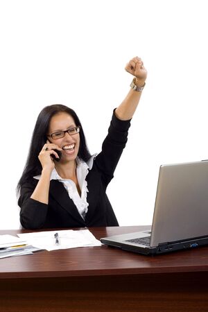 attractive businesswoman on the phone winningの写真素材