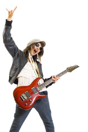 passionate woman guitarist playing the guitar and making a rock sign
の写真素材