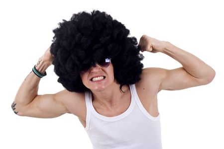 young funky man flexing his muscles on a white backgroundの写真素材