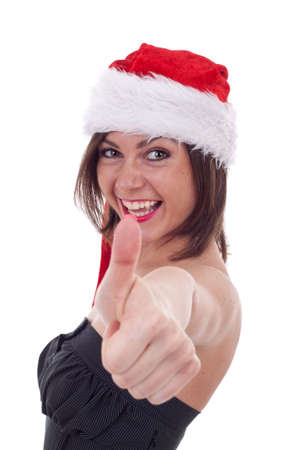 woman in red santa hat over white background , making ok hand gestureの写真素材