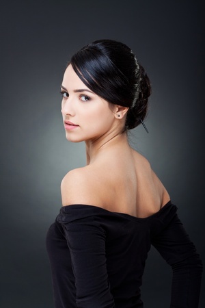Fashionable photo of elegant girl with nice hairstyleの写真素材