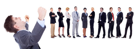 Sucessful business man on white background with business team behind