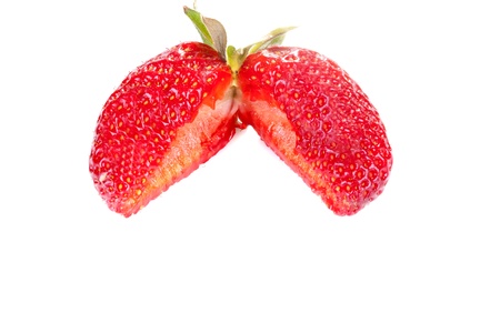Photograph of cut strawberry on a white backgroundの写真素材