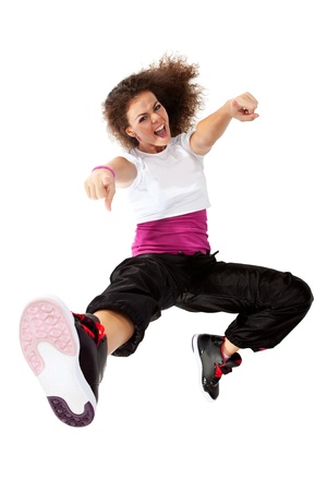 Teenage girl dancing hip-hop and pointing at the camera Teenage girl dancing hip-hop and pointing at the camera