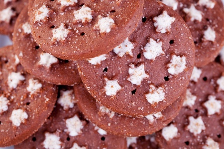 Close up of delicious fresh brown cookies backgroundの写真素材