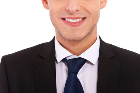 Closeup shot of business suit on a man, over white background の写真素材
