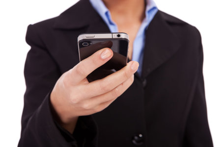 closeup image of a business woman texting on a smartphone on white background
