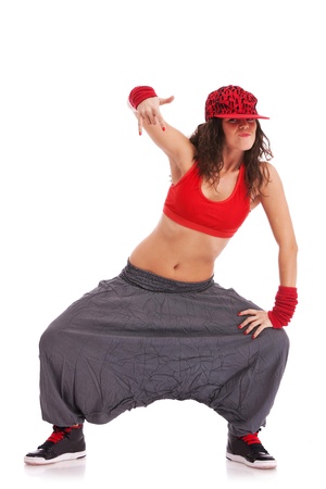 modern woman street dancer posing in a cool position showing rock sign modern woman street dancer posing in a cool position showing rock sign