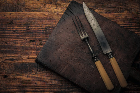 knife and fork wearing the patina of time waiting for you to use them for eating