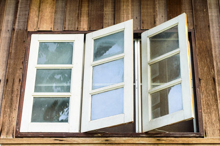 White window and browe wood background