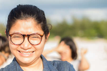 Woman is spectacled eyes in date the strong sunlightの写真素材