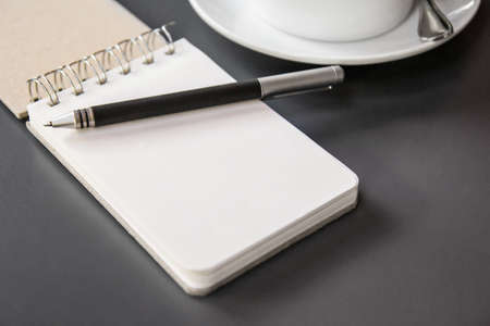 Booklet and pen on the table の写真素材