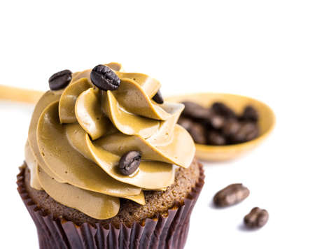 Coffee cupcakes on white backgroundの写真素材