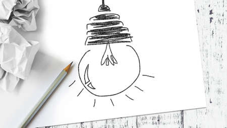 Light bulb sketch on paperの写真素材