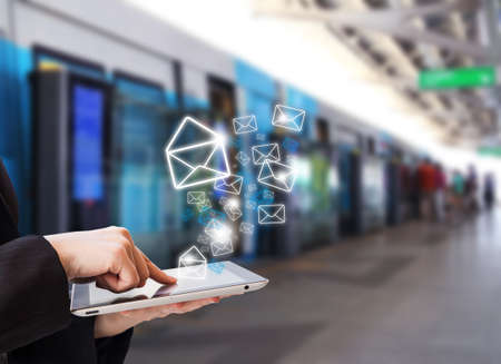 Businesswoman sending emailの写真素材