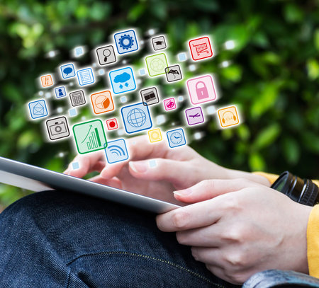 Young woman using digital tablet