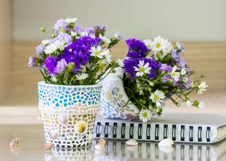 Flowers in mosaic flower pot decorated living roomの写真素材
