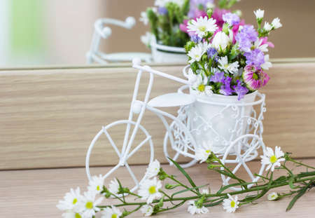 Flowers decoration on bicycle in the bedroomの写真素材