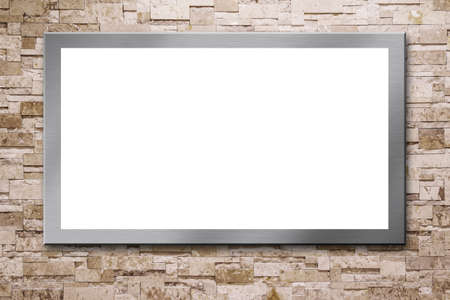 Blank billboard on the stone wallの写真素材