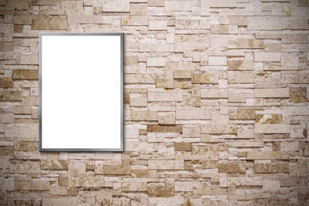 Blank billboard on the stone wallの写真素材