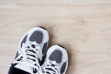 Sport shoes on the wooden floorの写真素材