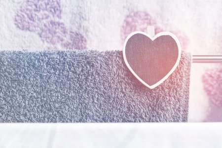 Love concepts of wooden heart clothespin