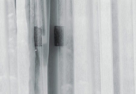 Airy curtain at window in the bedroom