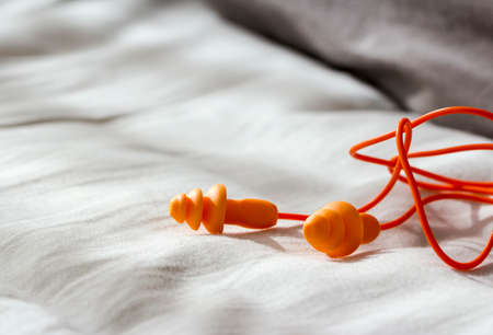 Earplugs on the bedroomの写真素材