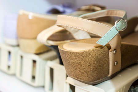 Woman shoes in the shoes cabinetの写真素材