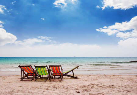 Beach chairs on beautiful tropical beachの写真素材