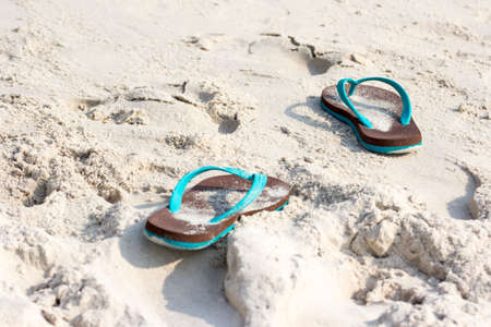 Slippers on the beachの写真素材