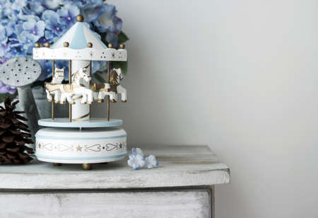 Carousel horse on vintage cabinetの写真素材